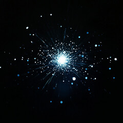A black screen, a small blue sparkle in the center, the sparkle is glowing bright