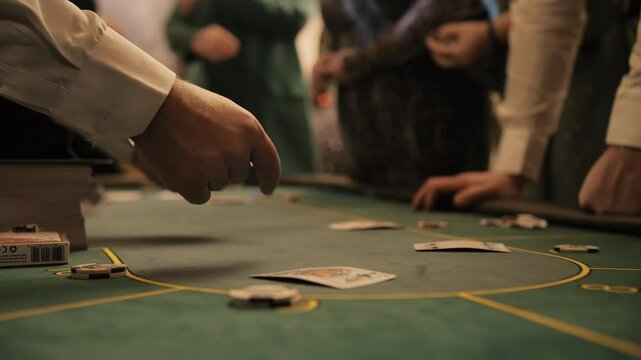 Players placing bets at casino table