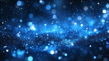 Abstract watercolor background in blue tones, with dark and light shades mimicking a night sky filled with shimmering stars.