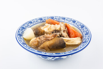 A bowl of carrot stewed with beef trotter bone soup