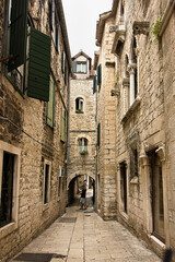 Fototapeta premium Narrow street with old houses in the historical centre of Split, Dalmatia