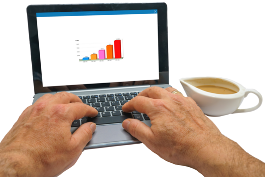 Analyzing Bar Chart on Laptop with Coffee Cup