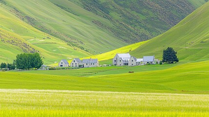 Picturesque rural houses nestled in a valley of rolling green hills