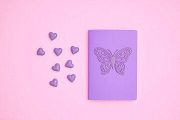 small purple card with butterfly design small purple hearts