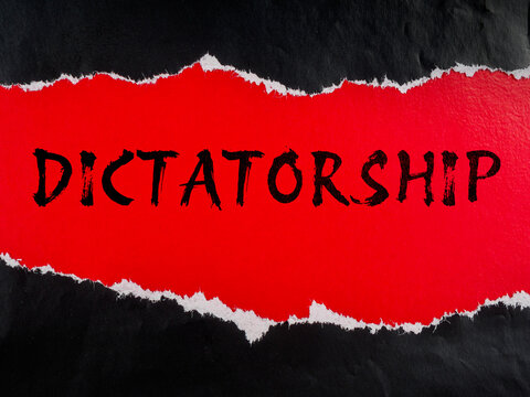 dictatorship text title on colored black red paper background