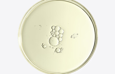 The texture of a cosmetic serum or body gel in a Petri dish.