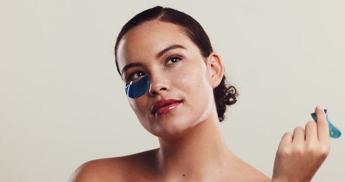 Studio, woman and skincare with eye patch for dermatology, facial and mask product for dark circles. Mockup, female person and beauty with gel for antiaging treatment, cosmetics and white background