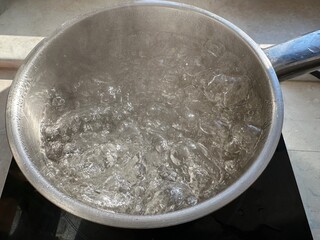 boiling hot water on the stove
