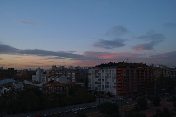 Silhouettes of the city's buildings at sunset