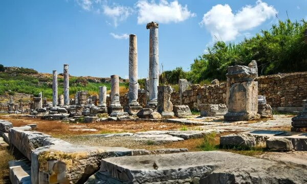 Ancient Forum in Perga, camera flying  abate the ancient archaeological site with temples and administrative buildings ruins 
