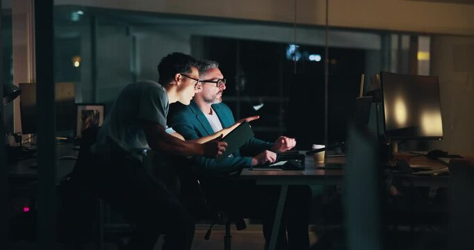 Night, tablet and business men in office with computer for system administration with IT support. Digital technology, deadline and manager with software engineer for advice, help or feedback.