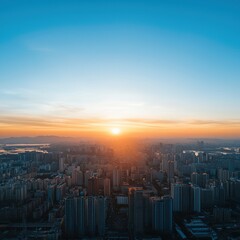 Fototapeta premium A high-angle shot of a cityscape during sunrise.
