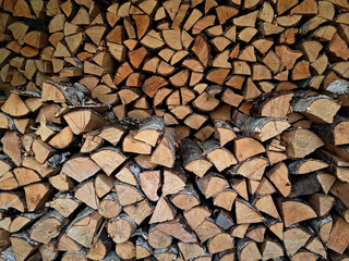 Stacked firewood of different woods
