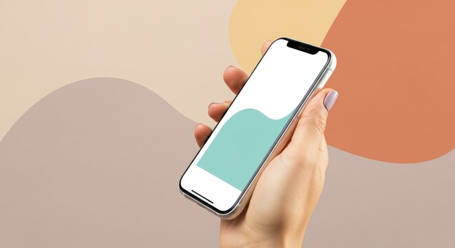 A person is holding a white iPhone in their hand