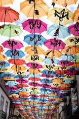 Beautiful colored street with umbrellas