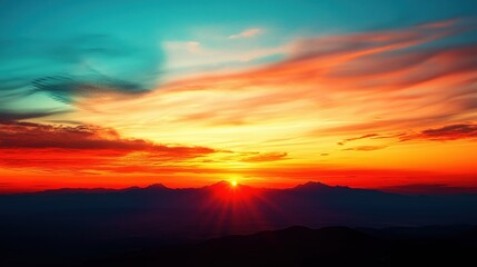 Obraz premium Utah Sunrise Photography: Brilliant Colors and a Glowing Horizon Illuminate Expansive Desert Landscapes in a Spectacular Dawn.