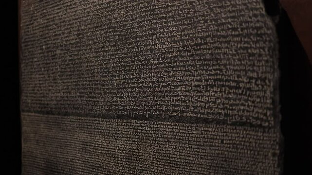 A stone that speaks across millennia&mdash;this ancient slab holds the secret to a lost language. Its etched words, preserved through time, whisper the echoes of pharaohs and scribes.