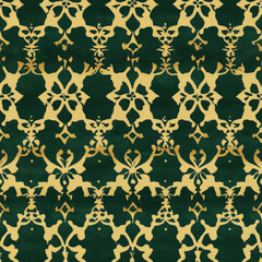 A classic arabesque pattern with symmetrical shapes in deep green and gold hues