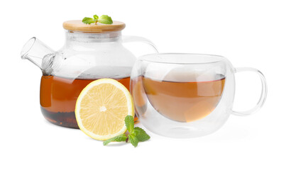 Tasty mint tea, lemon and fresh leaves isolated on white
