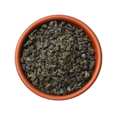 Dry tea leaves in bowl isolated on white, top view