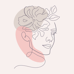 Woman's face with a large flower. Line art. 