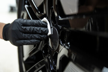 Ceramic protective coating applied on the car rim ensures a high-gloss finish and long-lasting...
