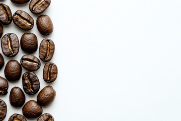 Close-up of roasted coffee beans on a clean white background for culinary use.