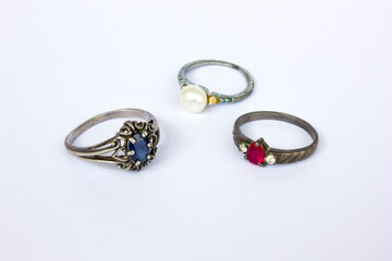 Silver rings adorned with beautiful gems isolated on white background, accessories.