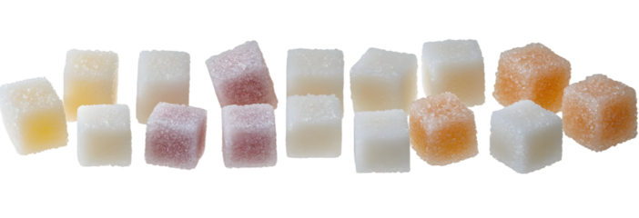 Various sugar cubes arranged artistically on a white background. transparent background.
