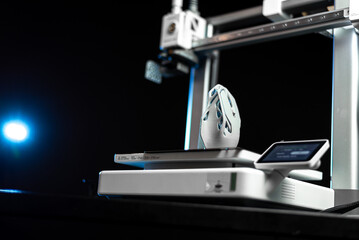 3D printer prints small parts. Prototyping concept