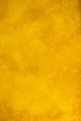 Closeup of Easter yellow wall with seamless pattern.