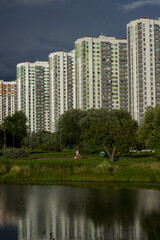Modern apartment buildings on the river bank