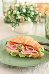 Ham and Cheese Croissant Sandwich. Healthy breakfast.