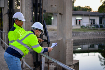 Structural engineers and technicians are rigorously inspecting the dam's floodgates to ensure they are functioning properly.
