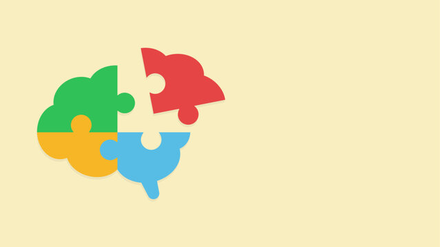 Four puzzle pieces in green, red, orange, and blue form a brain shape. One of the pieces is separated from the others.