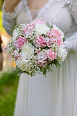 Wedding bouquet of white and pink flowers, wedding day, bride