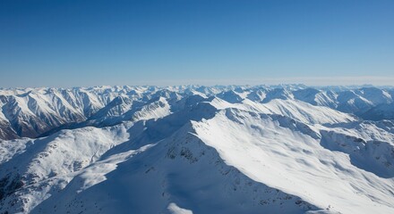 Snow Covered Mountain Range Under Clear Blue Sky on Sunny Day
