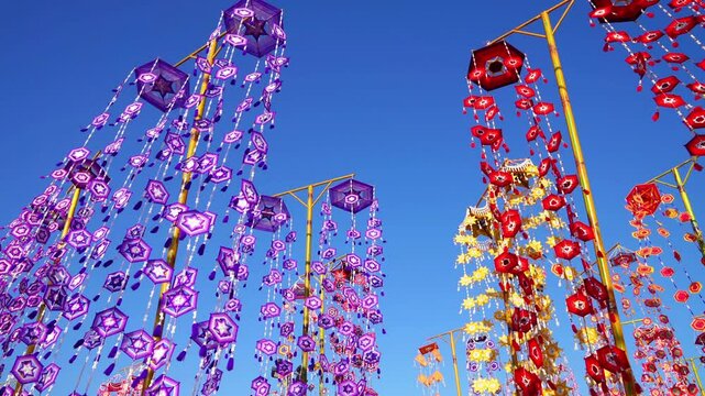 The sea of ​​Isaan tung(flags), brightly colored tung swaying with the wind.