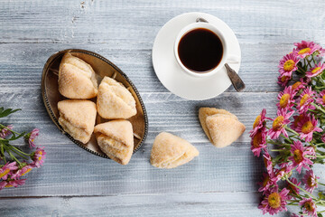 Homemade nut shaped russian soviet cookies and wafer rolls with pastry cream.