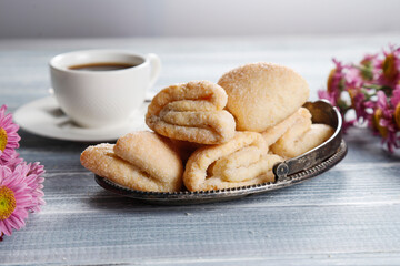 Homemade nut shaped russian soviet cookies and wafer rolls with pastry cream.