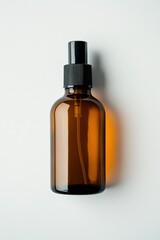 Amber Glass Spray Bottle on White Background