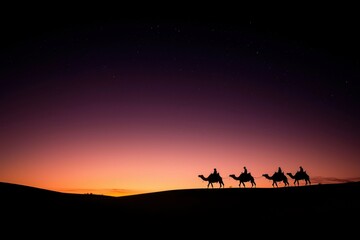 Desert camel caravan at sunset. Silhouette of travelers at dusk. Possible use for travel posters