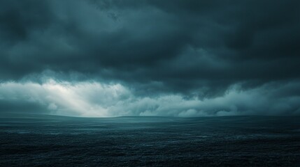 Dark Stormy Sea Under Dramatic Clouds with Soft Light Breaking Through