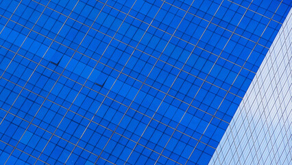A stunning play of blue tones and grid patterns creates a modern and dynamic composition. Would you like to enhance these photos further or analyze them for specific details