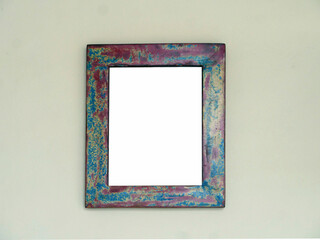 Blank picture frame on the wall, vintage and retro style.