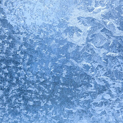 Frost patterns on glass as a background 