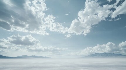 Obraz premium Serene Landscape with Expansive Sky and Soft Cloud Formation