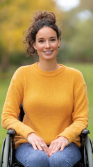 Obraz premium woman in yellow sweater smiles while sitting in wheelchair outdoors