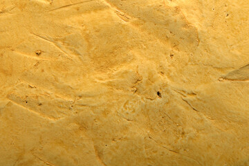
plaster art background in yellow sand color