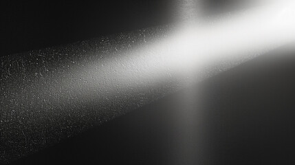 Abstract background featuring a spotlight illuminating a black wall with a gray gradient texture, creating a sleek and modern design with ample copy space for branding, advertising, or creative use, w